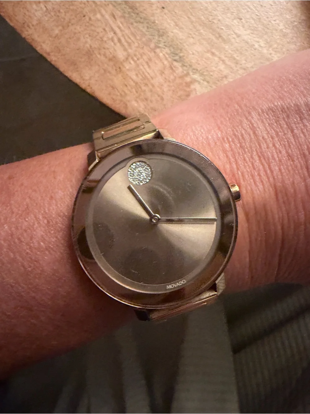 Movado Rose Gold Minimalist Bracelet Watch with a diamond